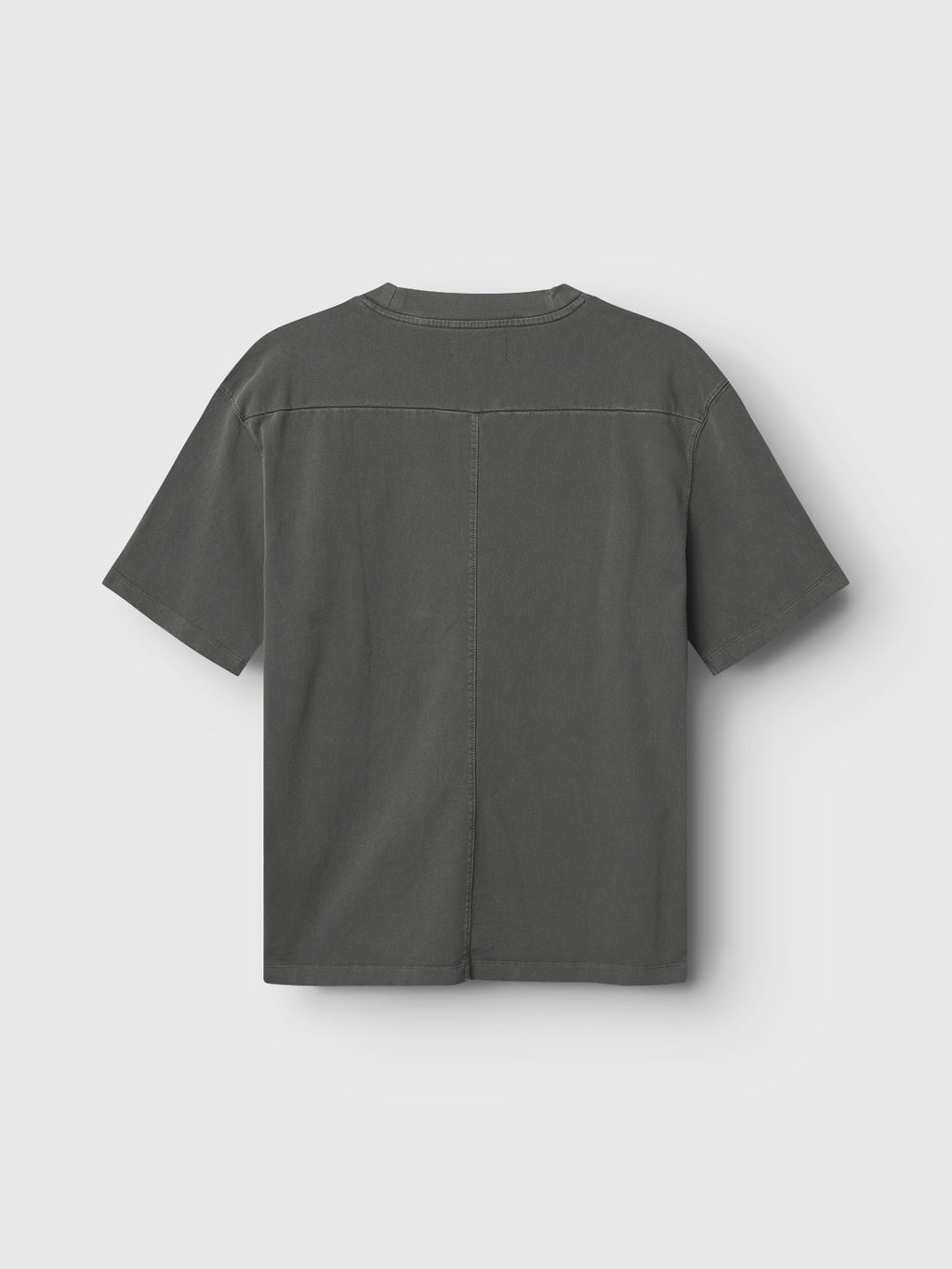 The Gabba GABnigel Wix Boxy Hour SS t-shirt in dark grey is shown from the back, displaying heavyweight cotton fabric and prominent seam details down the center and across the shoulders, set against a light grey background.