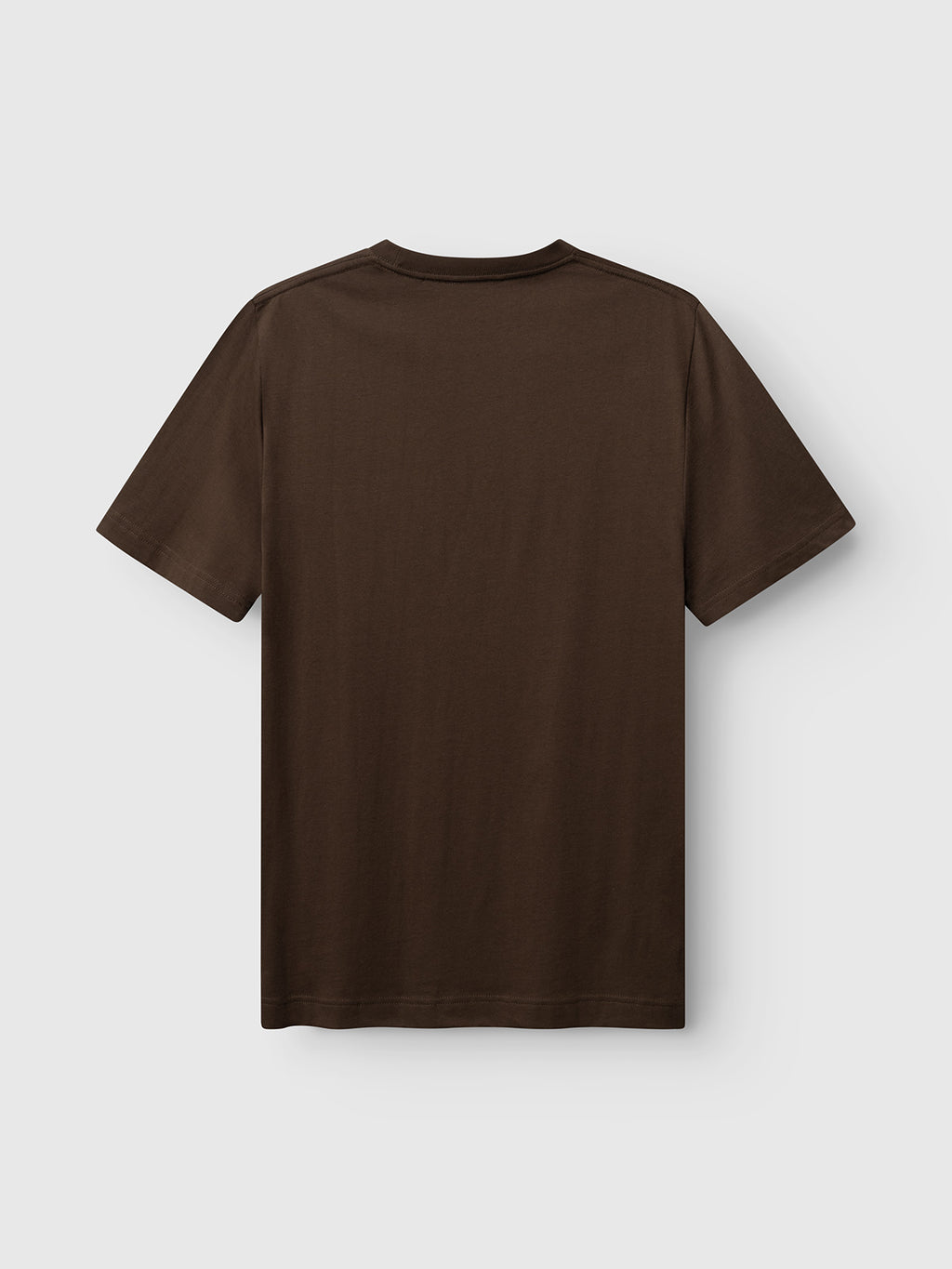The Gabba GABdune Logo GOTS SS T-Shirt in Brown Slate, made from organic cotton and featuring short sleeves, is displayed laid flat with the back side visible against a light gray background.
