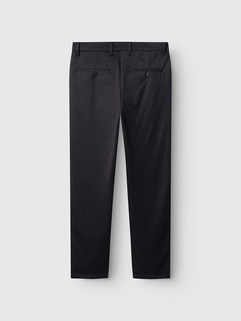 Back view of the Gabba GABpaul Nygo - Night Sky tailored black dress pants, featuring belt loops and two buttoned back pockets, crafted from comfort stretch fabric for ease of movement, displayed against a light gray background.