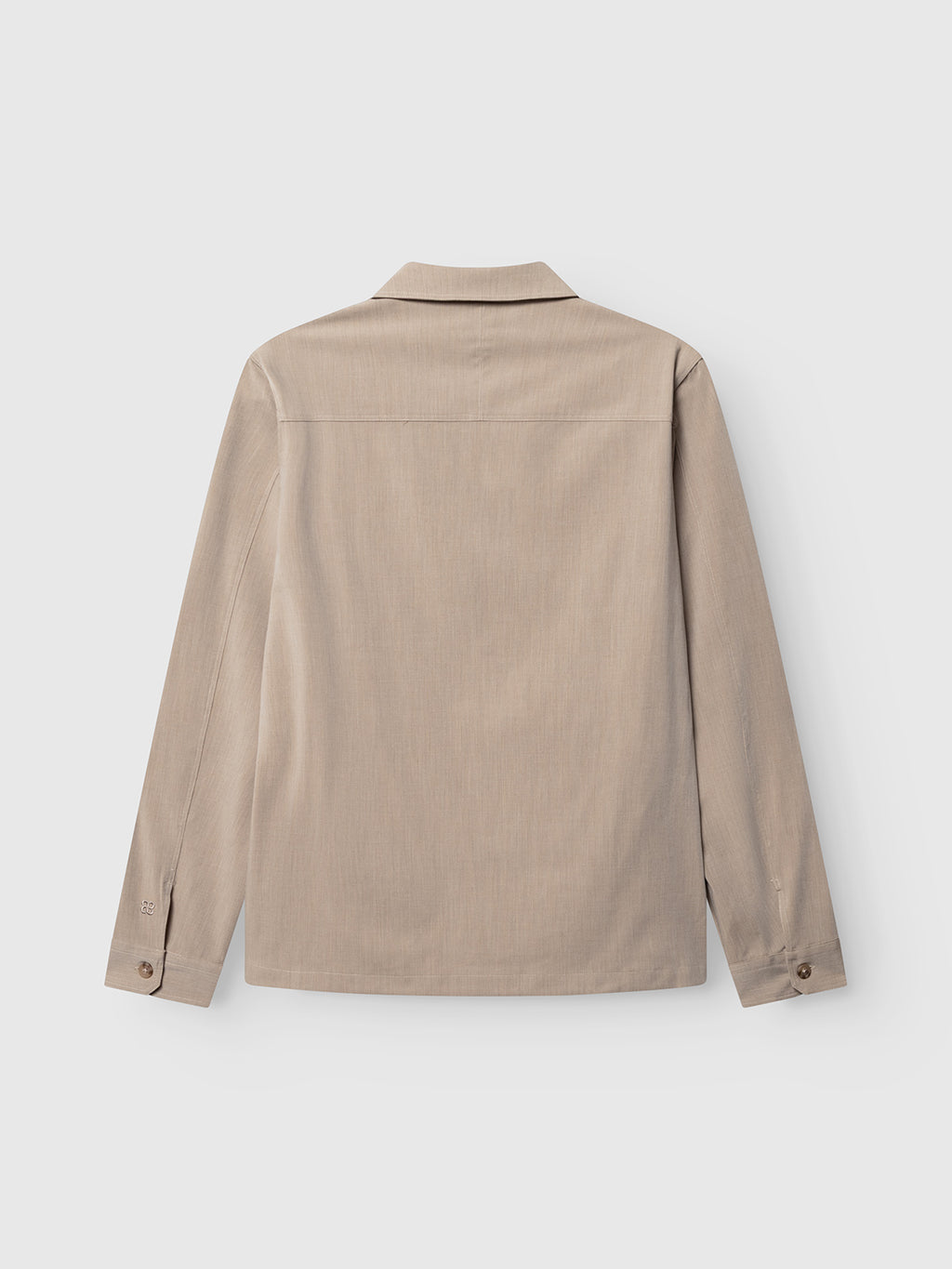 The Gabba GABtogger Tailor Dressy Overshirt in Sand is a regular fit, long-sleeve shirt crafted from soft melange fabric. Shown from the back against a plain white background, it features a straight yoke, simple collar, and buttoned cuffs.