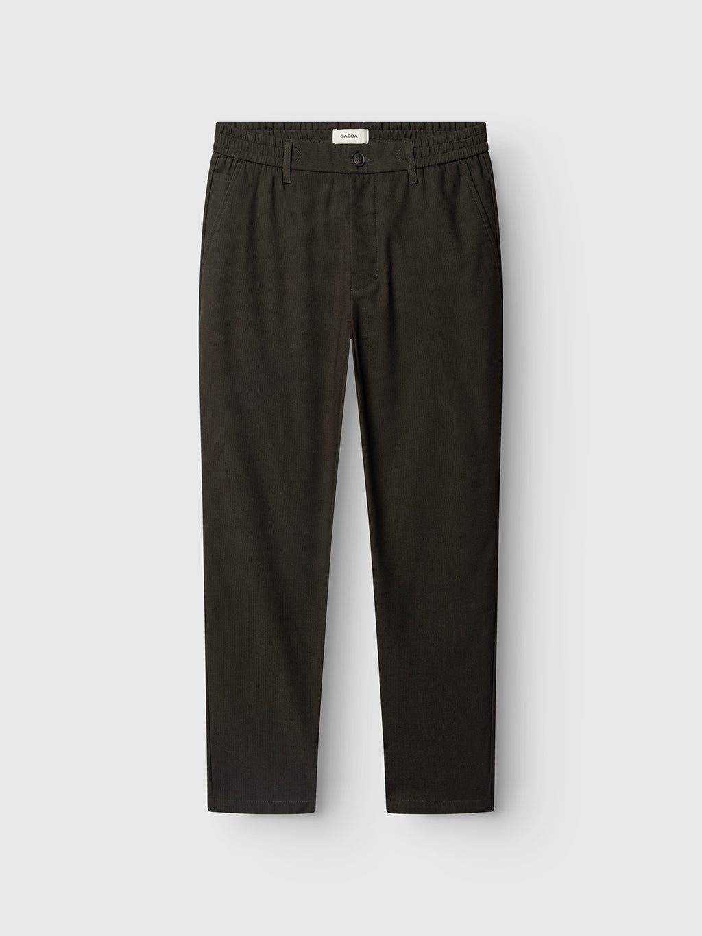 A pair of Gabba GABmonza Tasca Deme Pants in Forest Night, featuring a tailored design with an elastic waistband, button closure, and relaxed straight fit with straight legs, displayed flat against a light gray background.