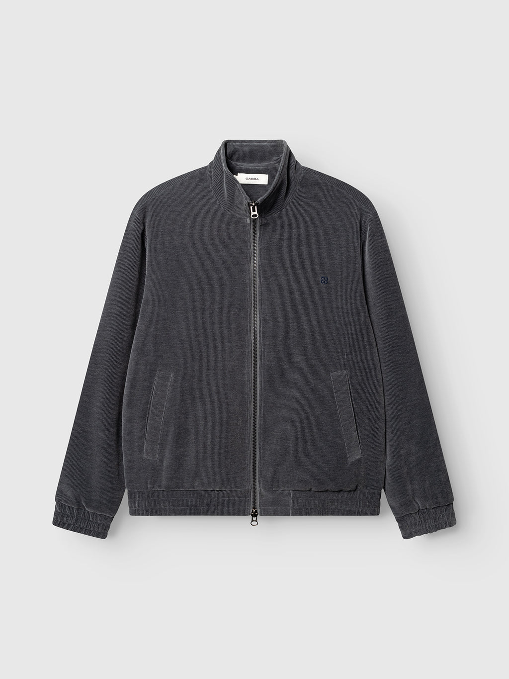 Introducing the GABnik Pulz Fune Jacket in Turbulence Blue by Gabba—a modern zip-up crafted from soft jersey corduroy. Featuring a stand collar, two front pockets, elastic cuffs and hem, and a full zip closure, this essential outerwear piece is showcased against a plain light background.