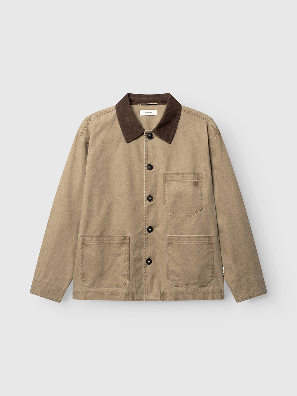 Gabba’s GABotto Tela Outerwear - Sand Crocker is a tan workwear jacket crafted from washed cotton canvas, featuring a dark brown corduroy collar, button front closure, one chest pocket, and two large front pockets, shown laid flat on a white background.