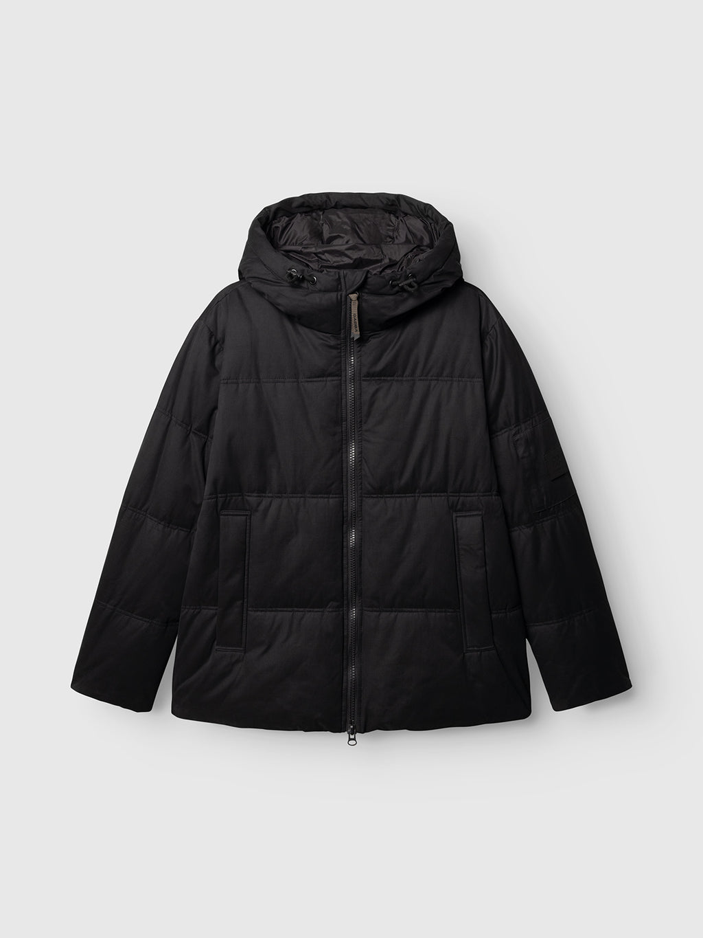 Gabba GABjulien Calle Outerwear - Black puffer jacket featuring a quilted design, front zipper, side pockets, and an adjustable hood.