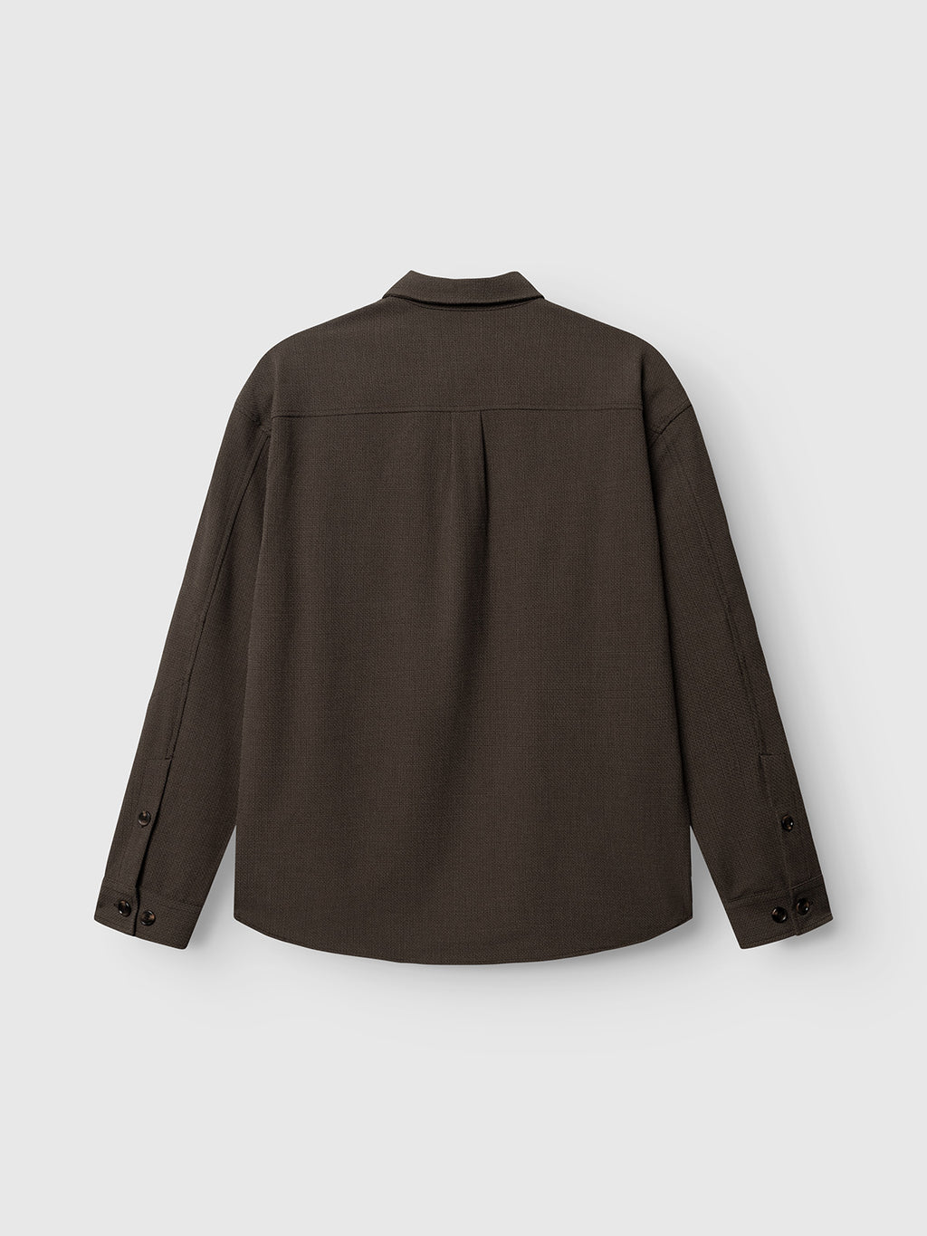 GABjens Over Rubin LS Overshirt - Brown Slate by Gabba, shown from the back against a light gray background, features buttoned cuffs, a straight hem, and is crafted from stretch dobby fabric for enhanced comfort.