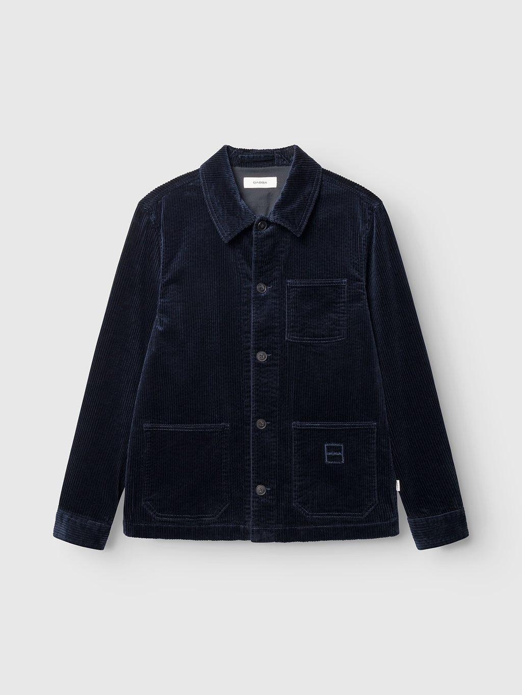 The Gabba GABbeta Ibre LS Overshirt in Dark Navy features a collar, button-up front, and three utility pockets, showcased against a light gray background.