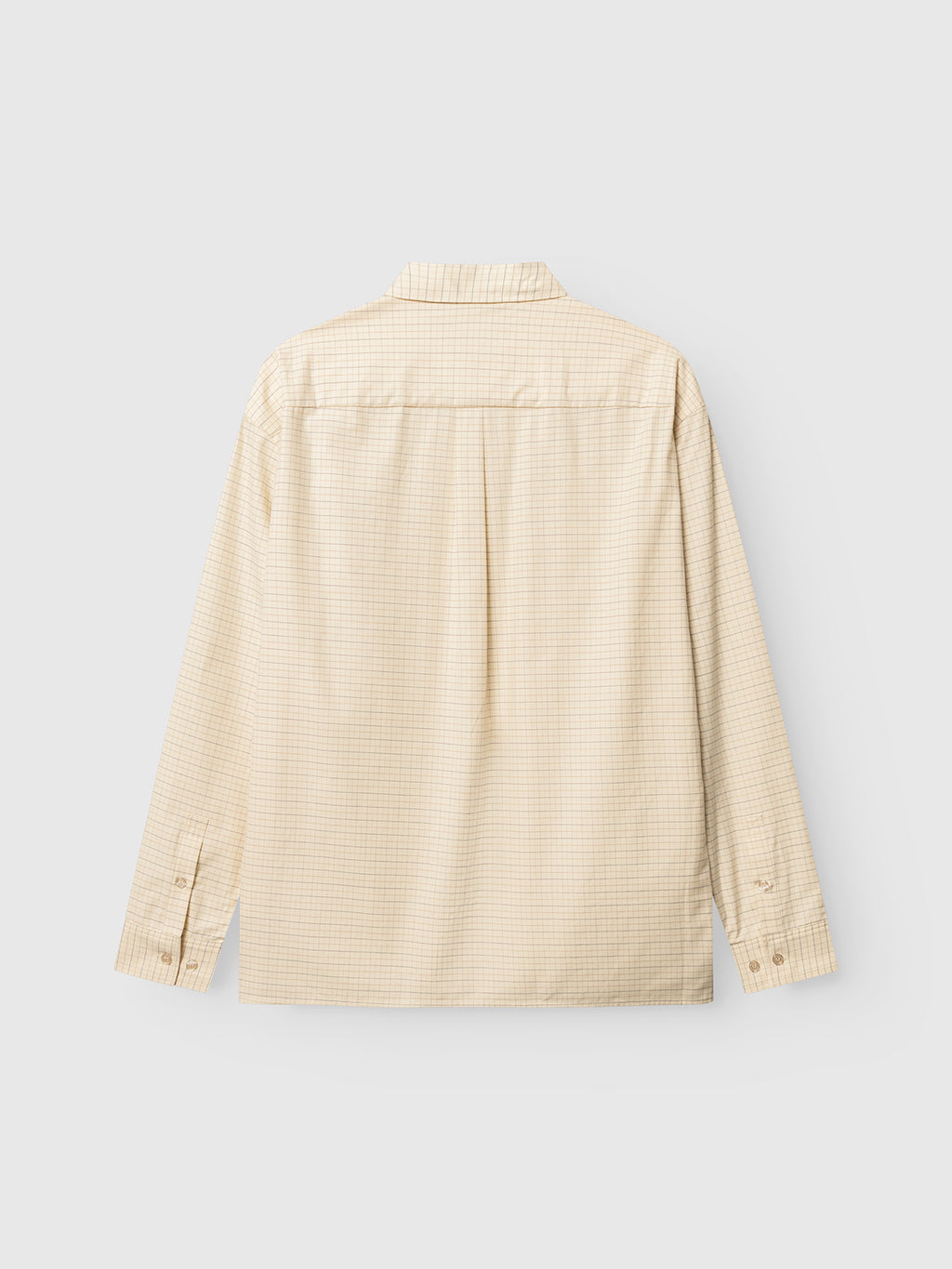 The GABjens Over Indie LS Shirt by Gabba is a long-sleeve, light sand button-up crafted from a cotton-blend fabric featuring a subtle grid pattern, displayed from the back against a plain light gray background.