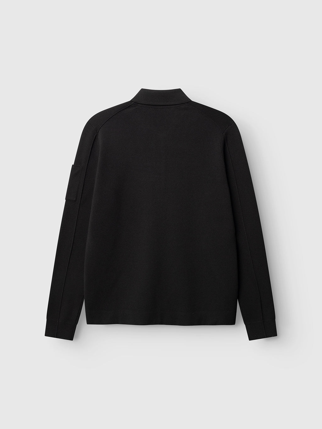 The Gabba GABadriel Zip Lume LS Knit – Meteorite is displayed from the back against a plain light gray background. Designed with a regular fit in a comfortable viscose blend knit, this black, long-sleeve collared jacket features a sleek full zip closure for versatile styling.