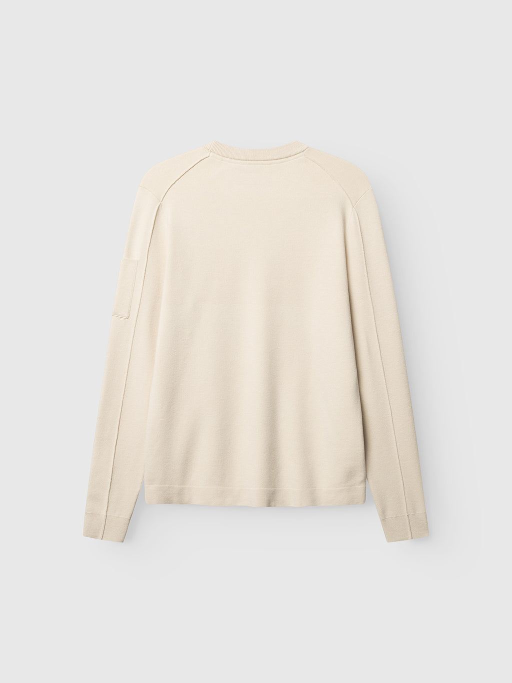 The Gabba GABadriel O-Neck Lume LS Knit in Birch is laid flat, shown from the back on a plain light gray background. This regular fit sweater features a crew neckline, visible seam details along the shoulders and sleeves, and is crafted from a soft viscose blend for added comfort.