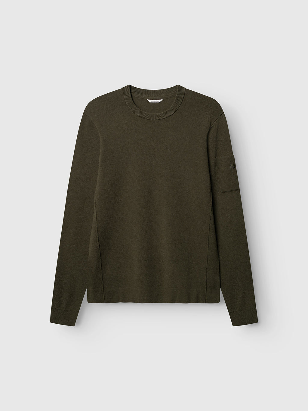 The Gabba GABadriel O-Neck Lume LS Knit in Forest Night is a regular-fit, long-sleeve sweater featuring a crew neck and subtle side seams, crafted from a mid-weight viscose blend and shown laid flat on a light gray background.