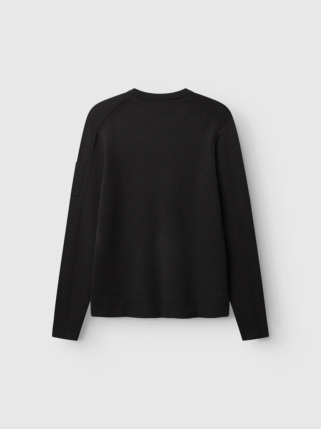 The Gabba GABadriel O-Neck Lume LS Knit in Meteorite is showcased from the back against a light gray background, featuring a plain black design with no visible logos or embellishments. Made from a soft viscose blend knit, this regular-fit sweater delivers comfort and versatile style.