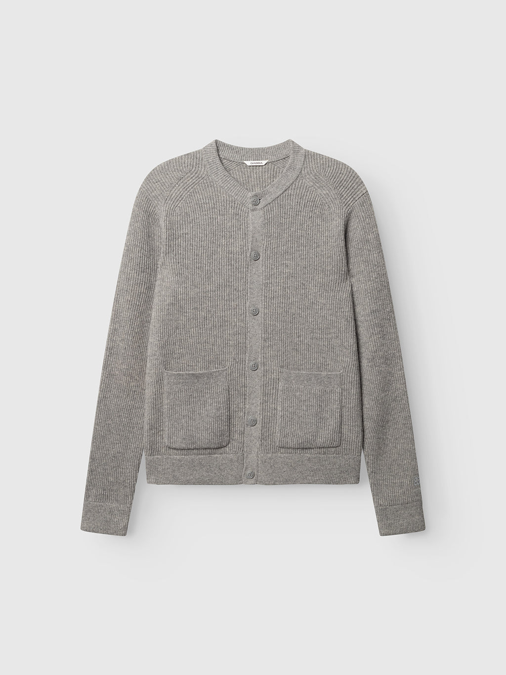 The Gabba GABremy Cardi Flash LS Knit in Grey Mel is a relaxed-fit, long-sleeve button-up wool cardigan featuring a ribbed texture and two front pockets, shown against a plain white background.