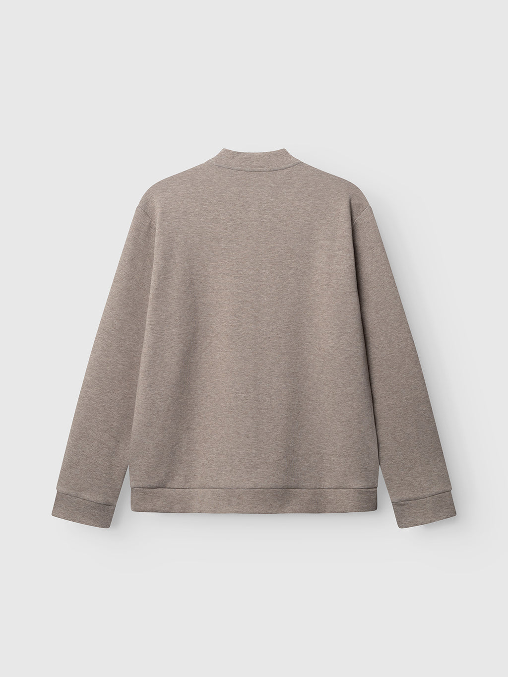 The Gabba GABnik Camp Lock Sweat - Sand Mel. is displayed from the back against a white background. Crafted from mid-weight interlock fabric, this modern taupe sweatshirt combines comfort and style for everyday wear.