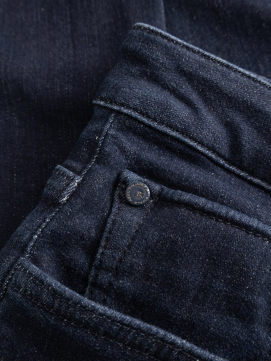 Close-up of the pocket on the Gabba GABjones Vanew Rinse Jeans in dark blue denim, highlighting detailed stitching, a metal rivet, and the texture of ISKO superstretch denim.