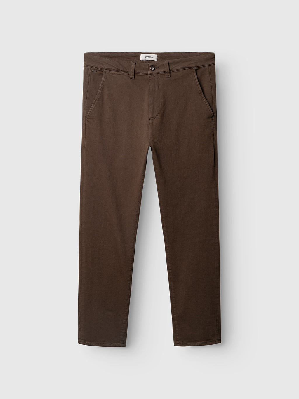 The Gabba GABpaul Hesky Pant in brown is a pair of slim-fit pants featuring front and back pockets, belt loops, and a button closure. Crafted from high-stretch fabric for all-day comfort, these pants are displayed flat against a light gray background.
