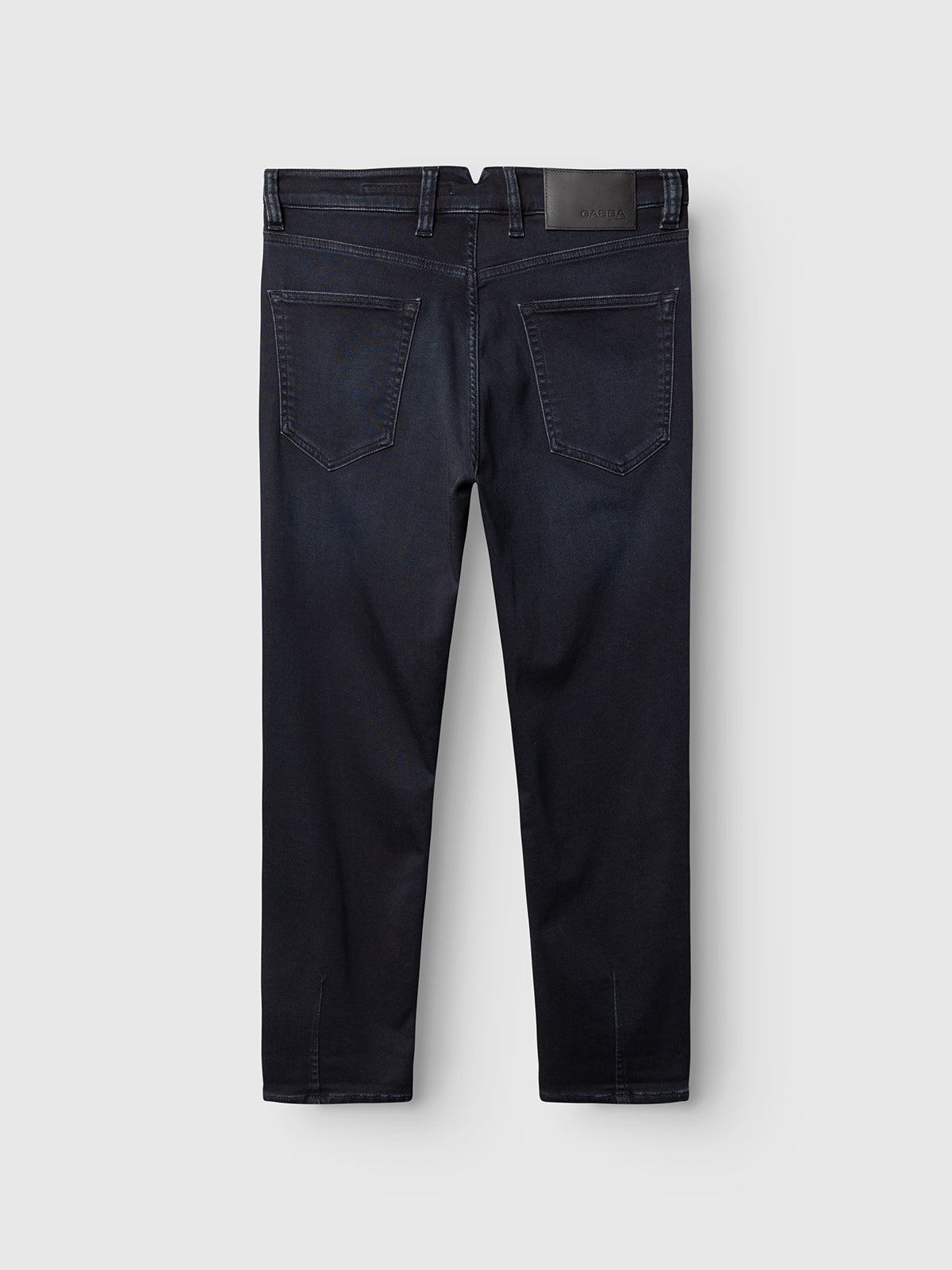 Gabba GABalex Cropped Torino RS2106 Jeans in dark blue denim shown from the back, featuring two rear pockets, subtle stitching, and a black leather patch on the waistband, displayed against a light gray background. Crafted from indigo denim with a relaxed tapered fit for modern comfort and style.