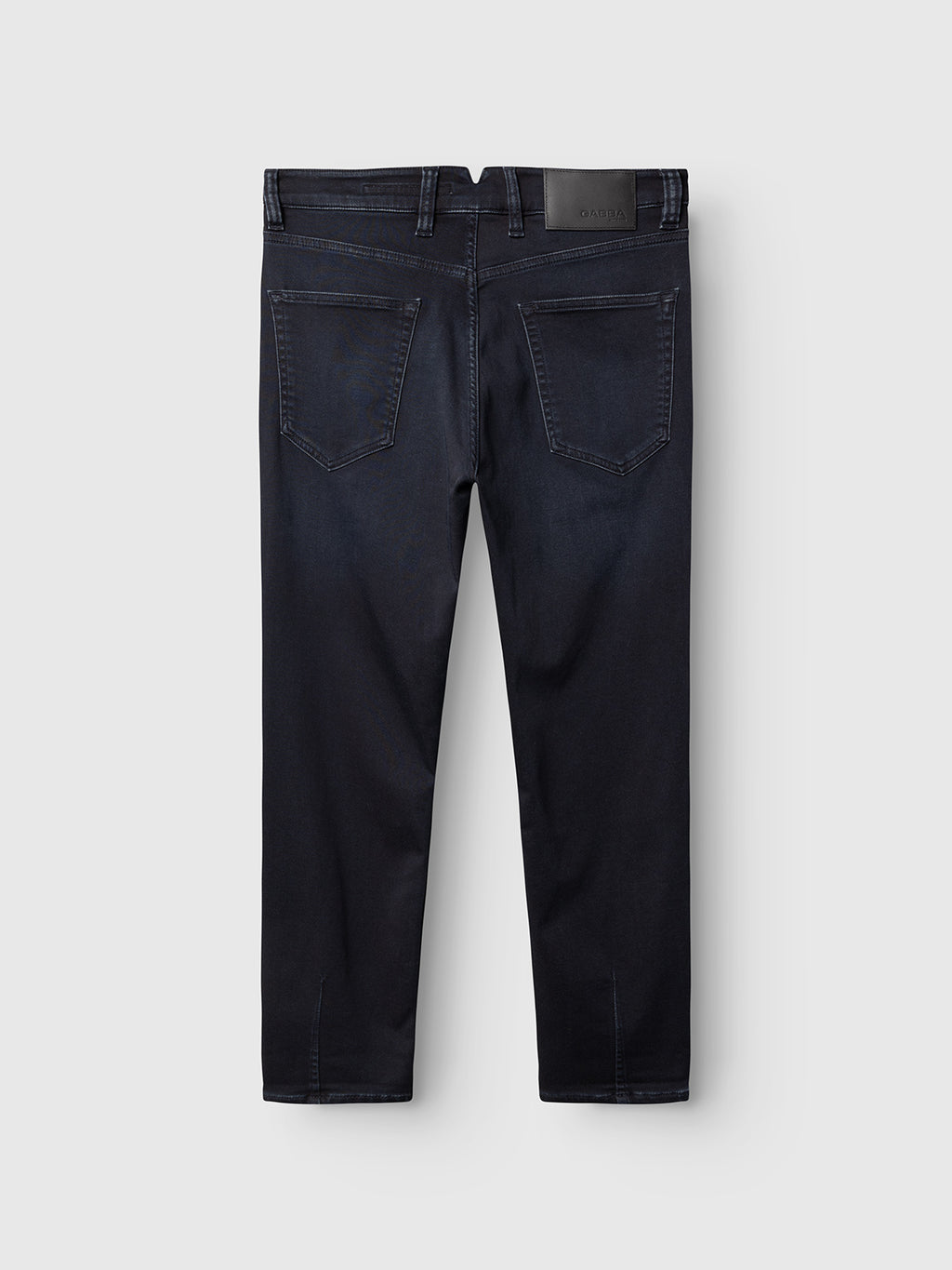 Gabba GABalex Cropped Torino RS2106 Jeans in dark blue denim shown from the back, featuring two rear pockets, subtle stitching, and a black leather patch on the waistband, displayed against a light gray background. Crafted from indigo denim with a relaxed tapered fit for modern comfort and style.
