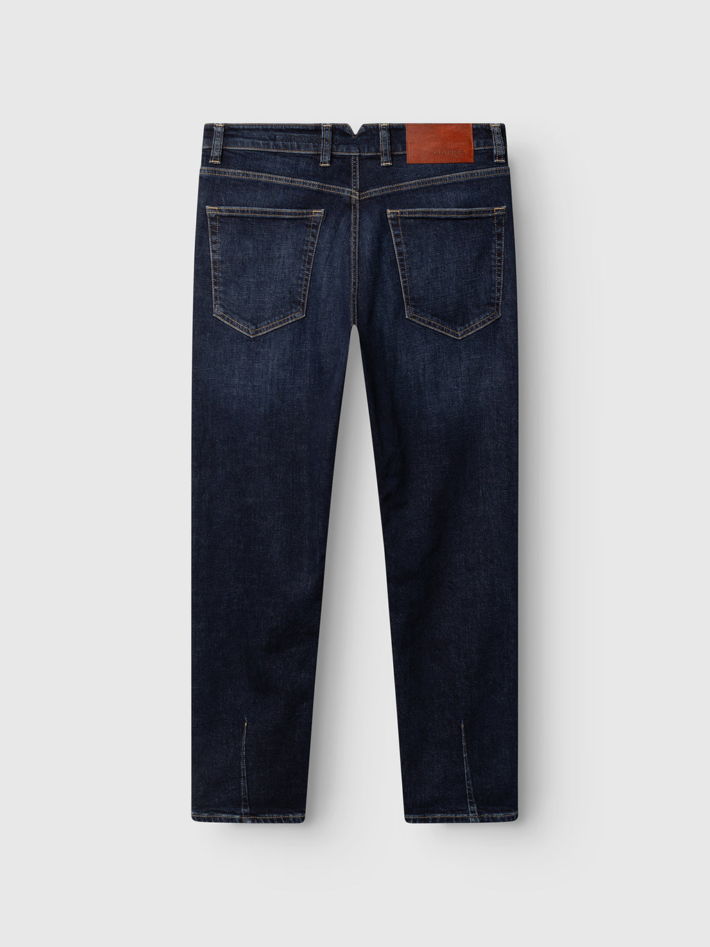 The Gabba GABalex Cropped Cros RS2108 Jeans RCS in dark blue denim are displayed from the back, highlighting two back pockets with visible stitching, a brown leather patch on the waistband, and a straight-leg cut. Crafted from cross-hatch denim, these jeans are laid flat on a plain light background.