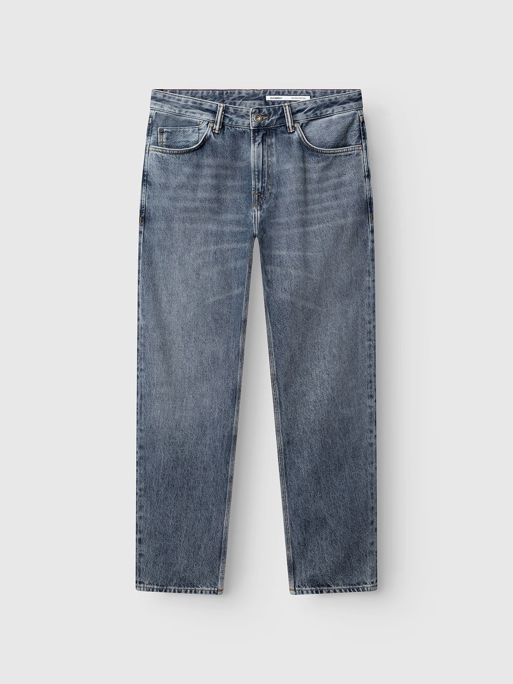The GABcarl Stone RS2103 Jeans by Gabba in mid-blue denim are crafted from premium ISKO fabric, featuring a straight-leg cut, five-pocket design, and button fly, laid flat on a light gray background.