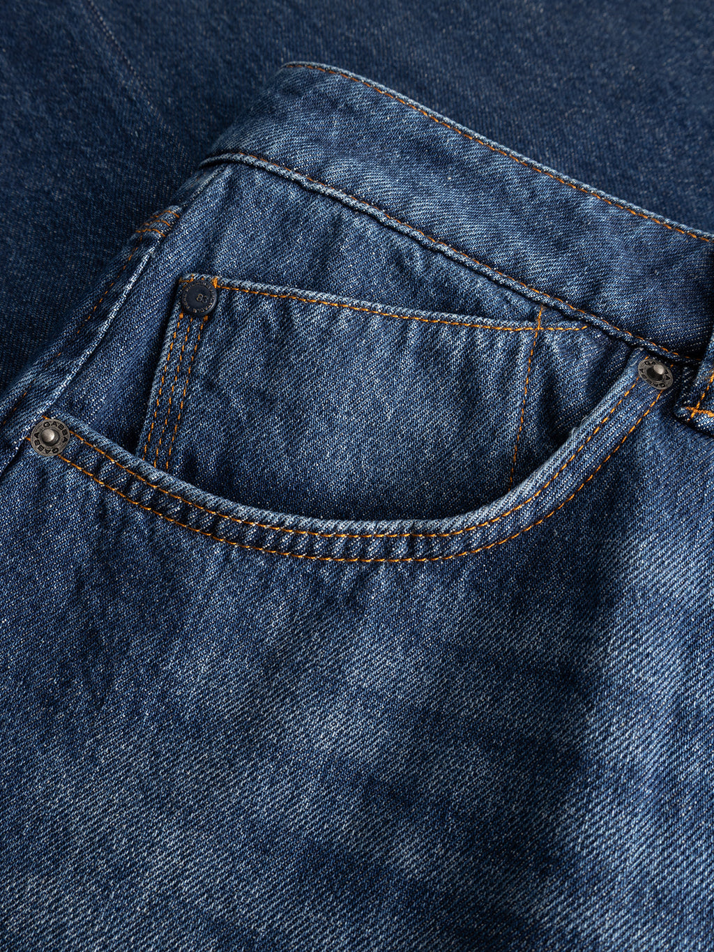 Close-up of the front pocket area on the Gabba GABcarl Tona RS2101 Jeans in mid blue denim, highlighting visible stitching, rivets, and the textured fabric.