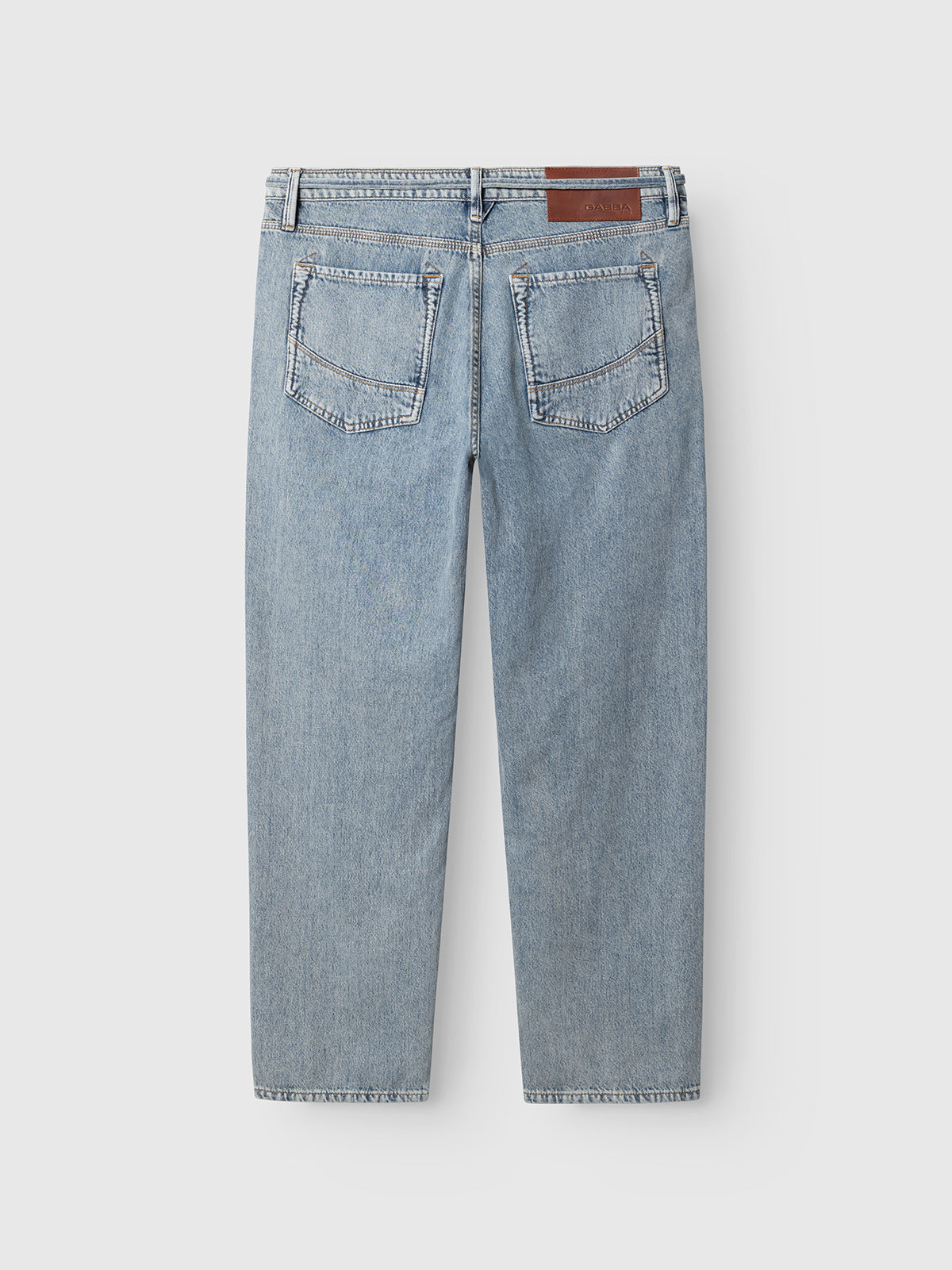 Gabba GABmax Tona RS2100 Jeans in mid blue denim, shown from the back with two large back pockets, belt loops, and a brown leather patch on the waistband. Crafted from organic cotton denim for comfort and durability.