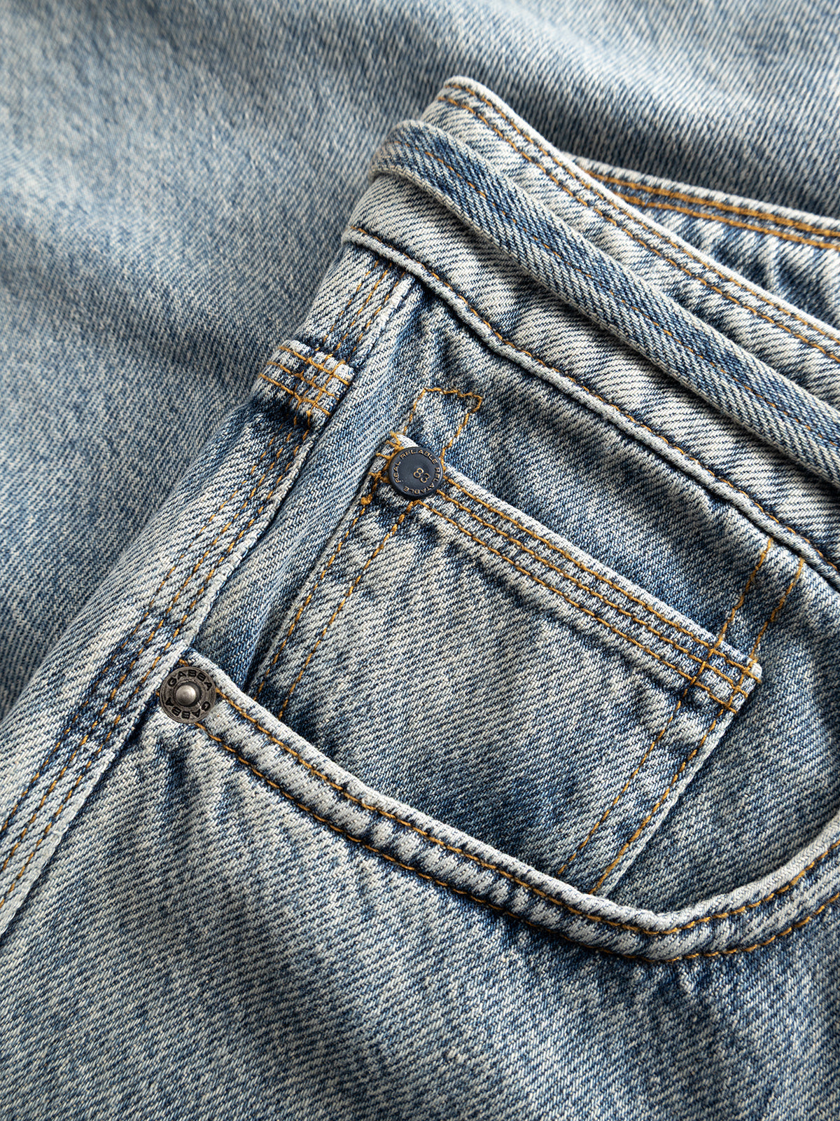 Close-up of the front pocket and coin pocket of the Gabba GABmax Tona RS2100 Jeans in mid blue denim, highlighting the detailed stitching and metal rivets on the organic cotton fabric.