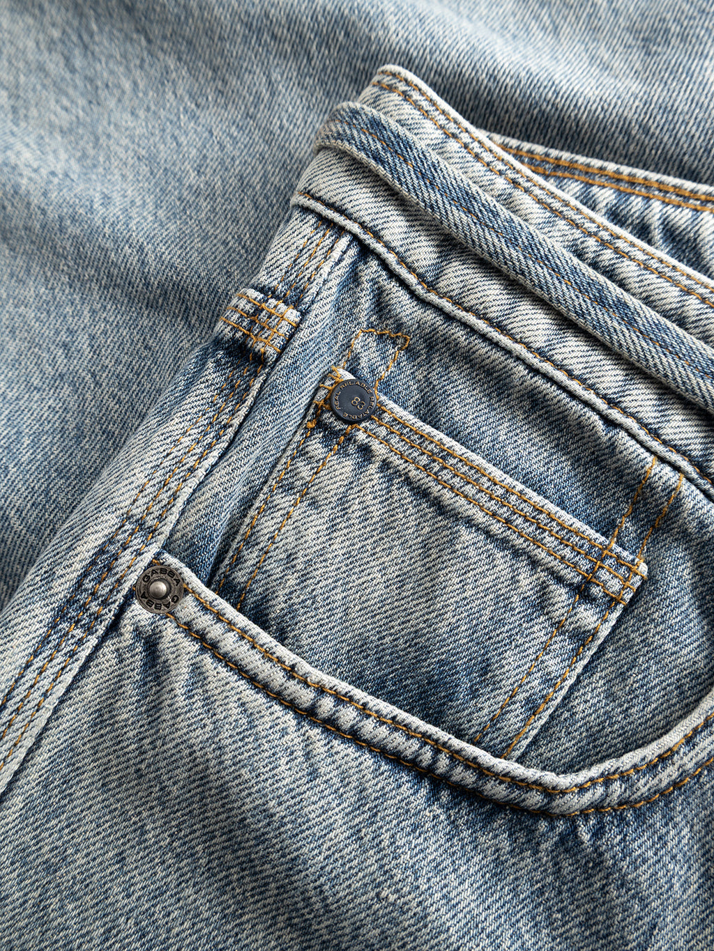 Close-up of the front pocket and coin pocket of the Gabba GABmax Tona RS2100 Jeans in mid blue denim, highlighting the detailed stitching and metal rivets on the organic cotton fabric.
