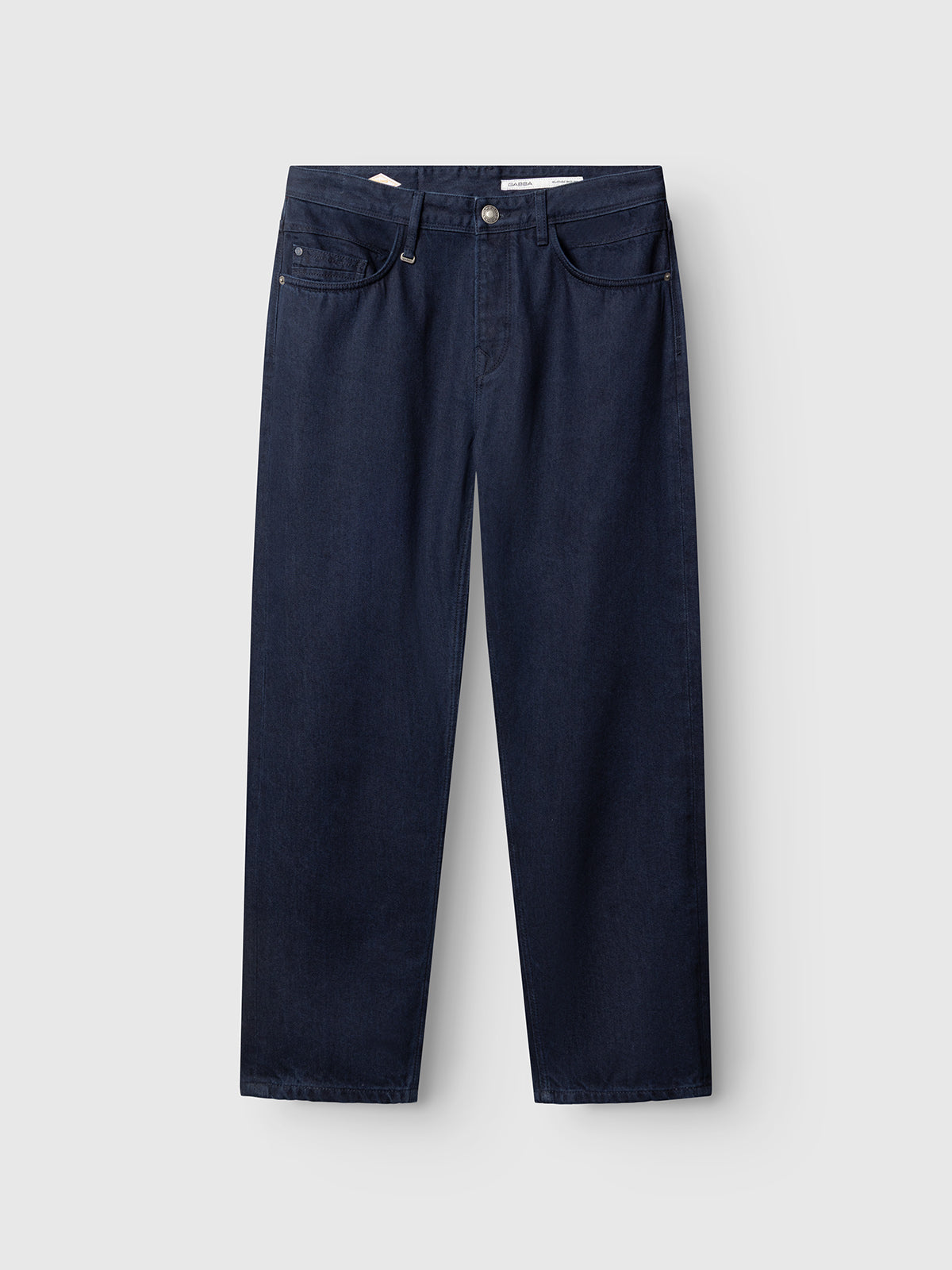 Gabba GABsenna Denia Rinse Jeans in dark blue denim feature a loose tapered straight-leg fit with five pockets and a button closure, showcased against a light gray background.