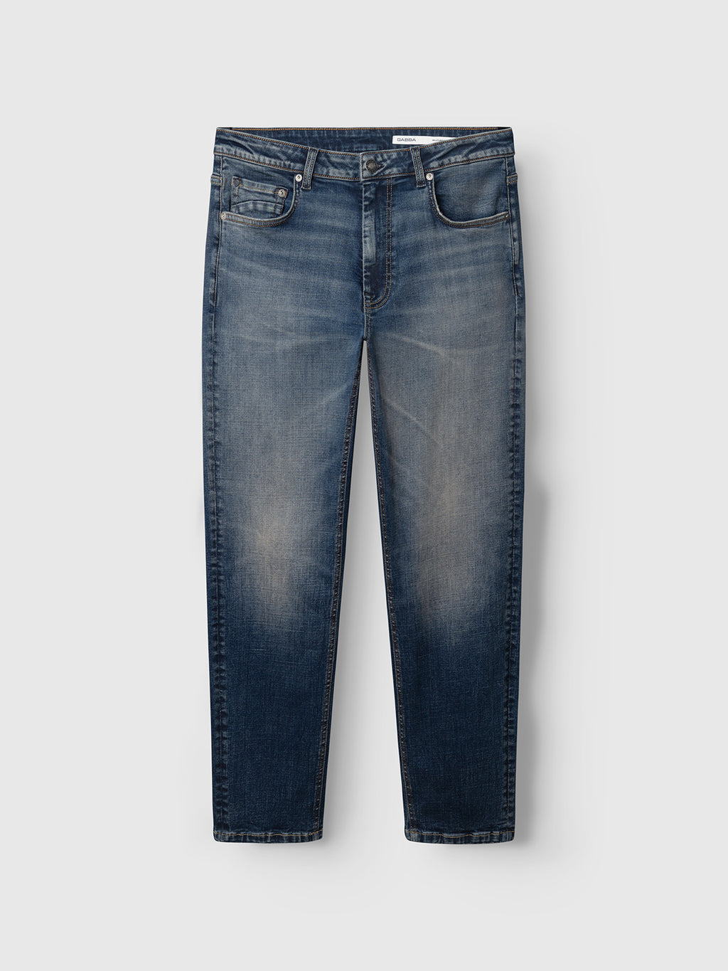 A pair of Gabba GABmarc Bekham DS0003 Jeans in mid blue denim, featuring a regular fit, mid-blue faded wash, comfort stretch material, front and back pockets, and a button closure, displayed against a plain light gray background.