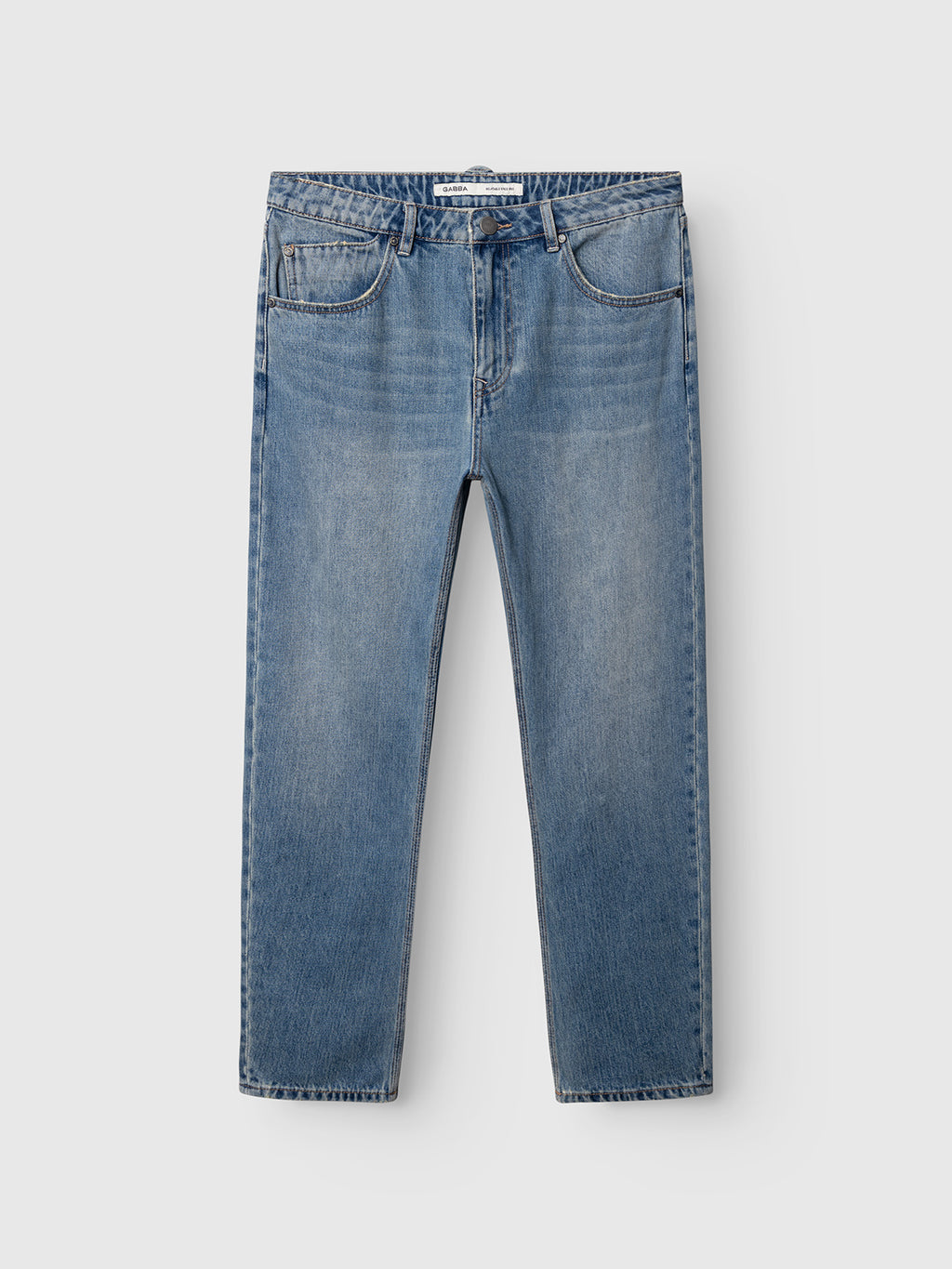 The Gabba GABcarl Bieffe GW0001 Jeans in Mid Blue Denim feature a straight-leg silhouette in a mid-blue wash, designed with a classic five-pocket construction, button closure, and subtle fading on the thighs. Crafted from soft slub denim, these jeans are displayed flat against a white background.