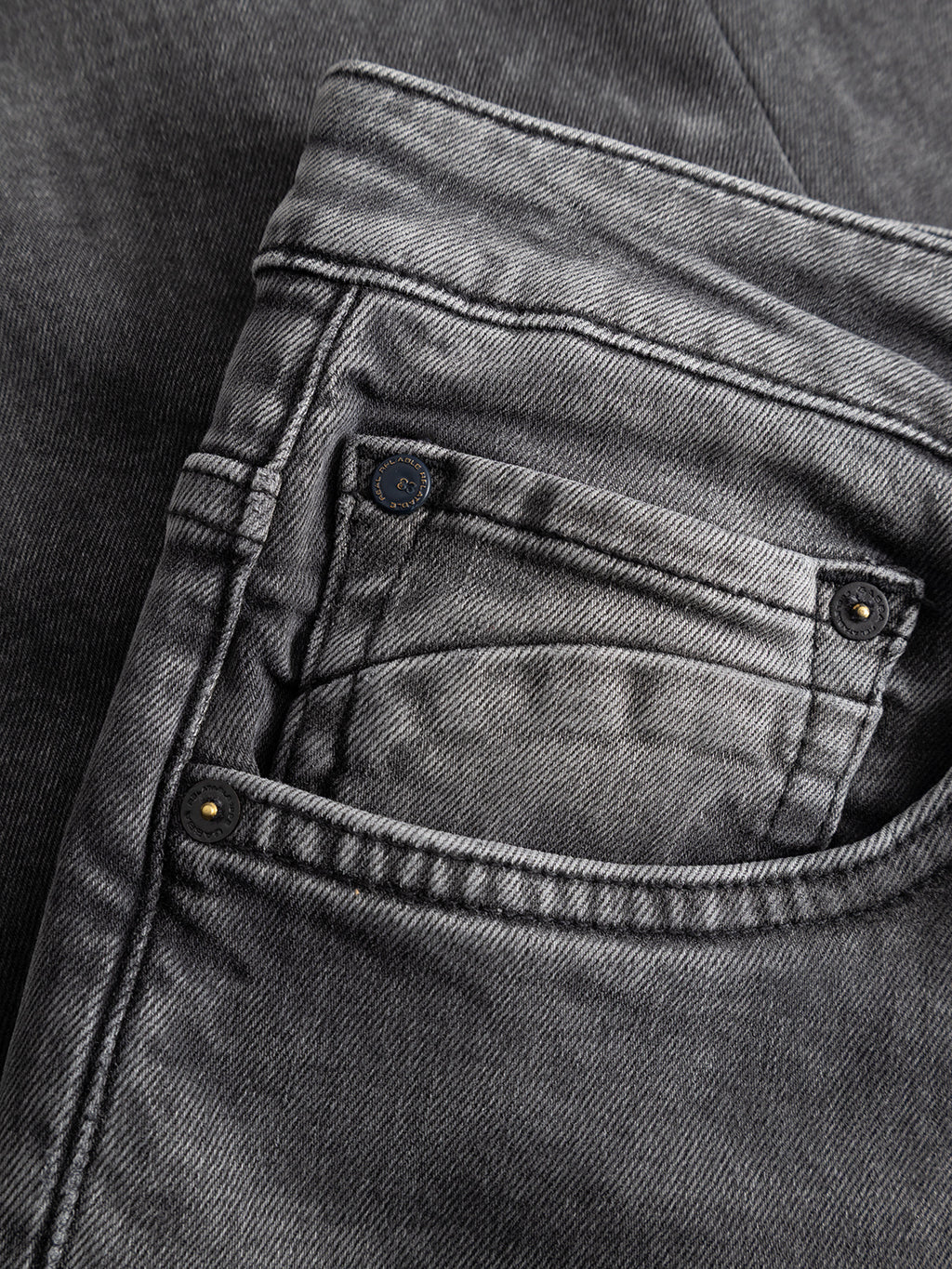 Close-up of the front pocket area of the Gabba GABmarc Blerb WW0032 Jeans in grey denim, highlighting the pocket stitching, rivets, and comfort stretch denim fabric texture.