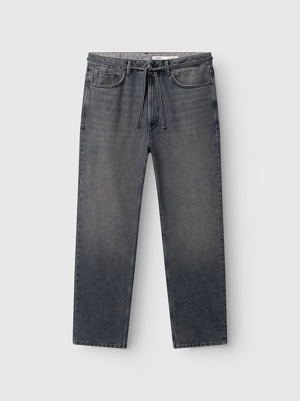 The GABnoah Primesto WW0030 Jeans by Gabba are straight-leg jeans in grey denim, featuring front and back pockets, crafted from heavy 3x1 fabric, finished with a fabric belt tied at the waist, and shown against a plain light grey background.