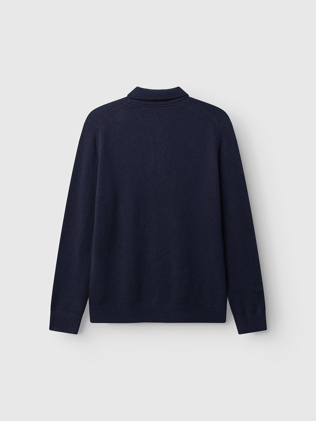 A Gabba GABworren Polo Aico LS Knit sweater in navy, shown from the back against a plain light gray background.