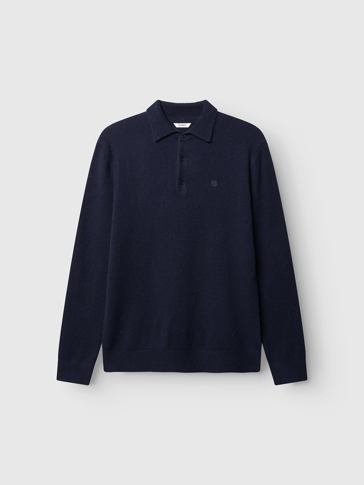 A dark grey long-sleeve flat-knit polo shirt with a collar and three buttons at the neck, crafted from soft wool, from Gabba’s GABworren Polo Aico LS Knit collection, displayed on a light gray background.