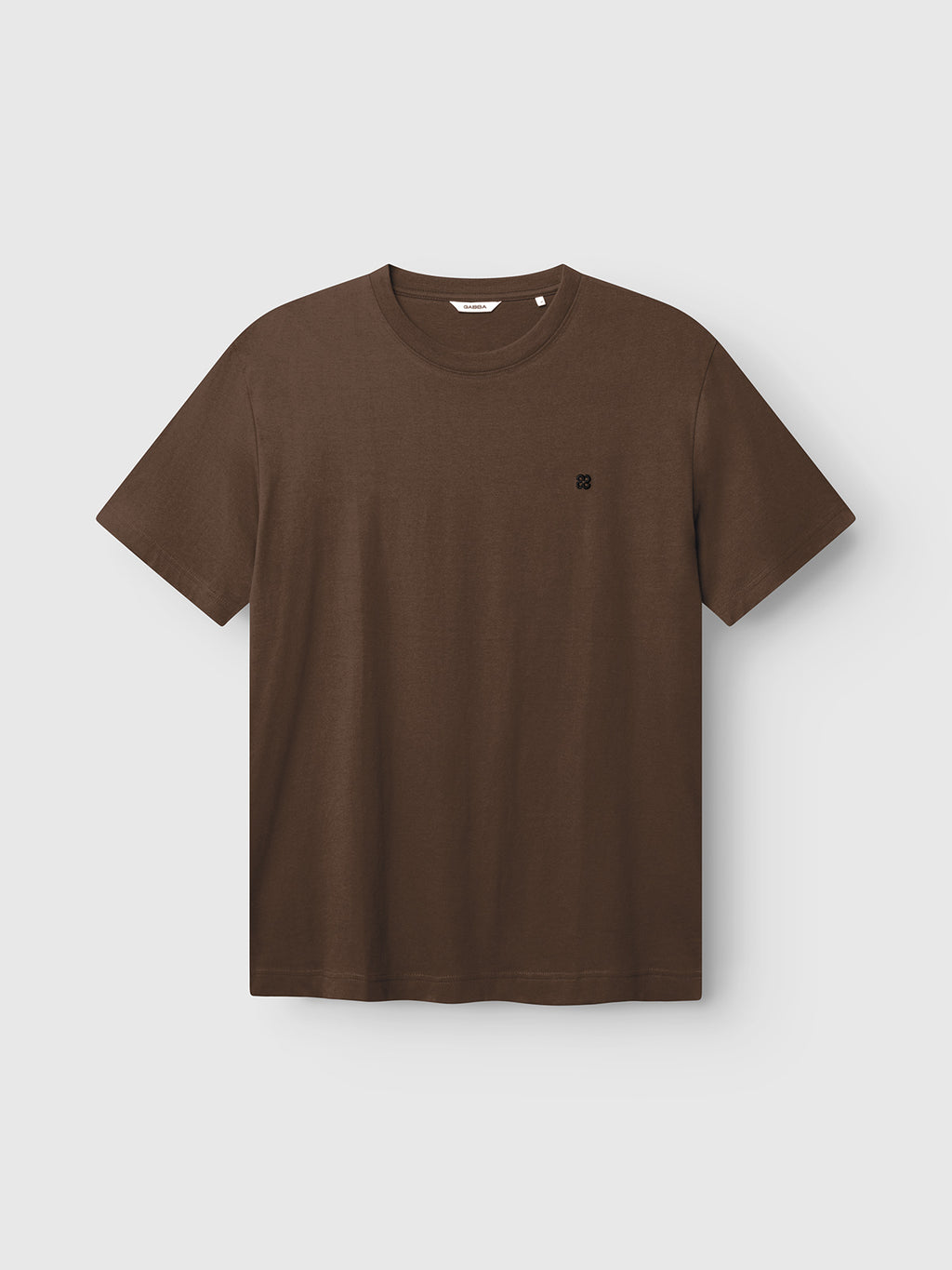 The Gabba GABdune Element GOTS SS T-Shirt in Brown Slate features a plain brown design with short sleeves and a small black logo on the left chest, shown against a light gray background.