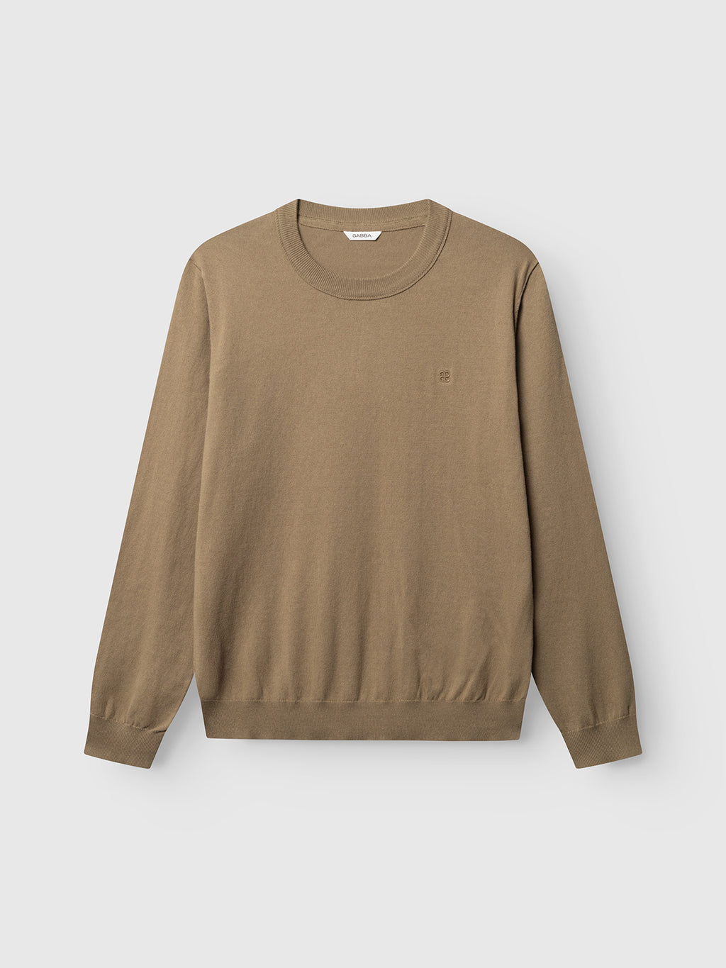 Sand Crocker-colored, long-sleeve Gabba GABfumo Element Spy LS Knit crewneck sweater with ribbed cuffs and hem, displayed flat against a white background. This flat-knit cotton sweater features a small, subtle logo on the left chest.