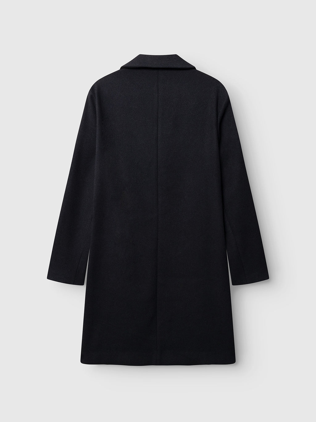 The Gabba GABleeds Plain Coat in navy, a long-sleeved, knee-length wool-blend overcoat with a collar and straight cut, is displayed from the back against a plain light gray background—an enduring piece of outerwear ideal for everyday wear.