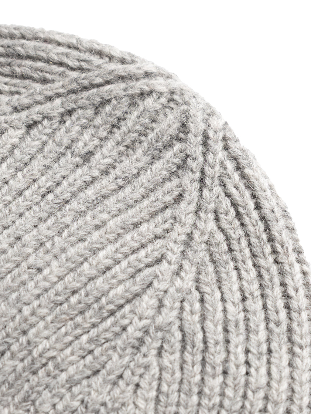 Close-up of the GABeast Flash Beanie in Grey Mel by Gabba, showcasing its gray ribbed knit texture and highlighting its cozy design as a stylish winter accessory.
