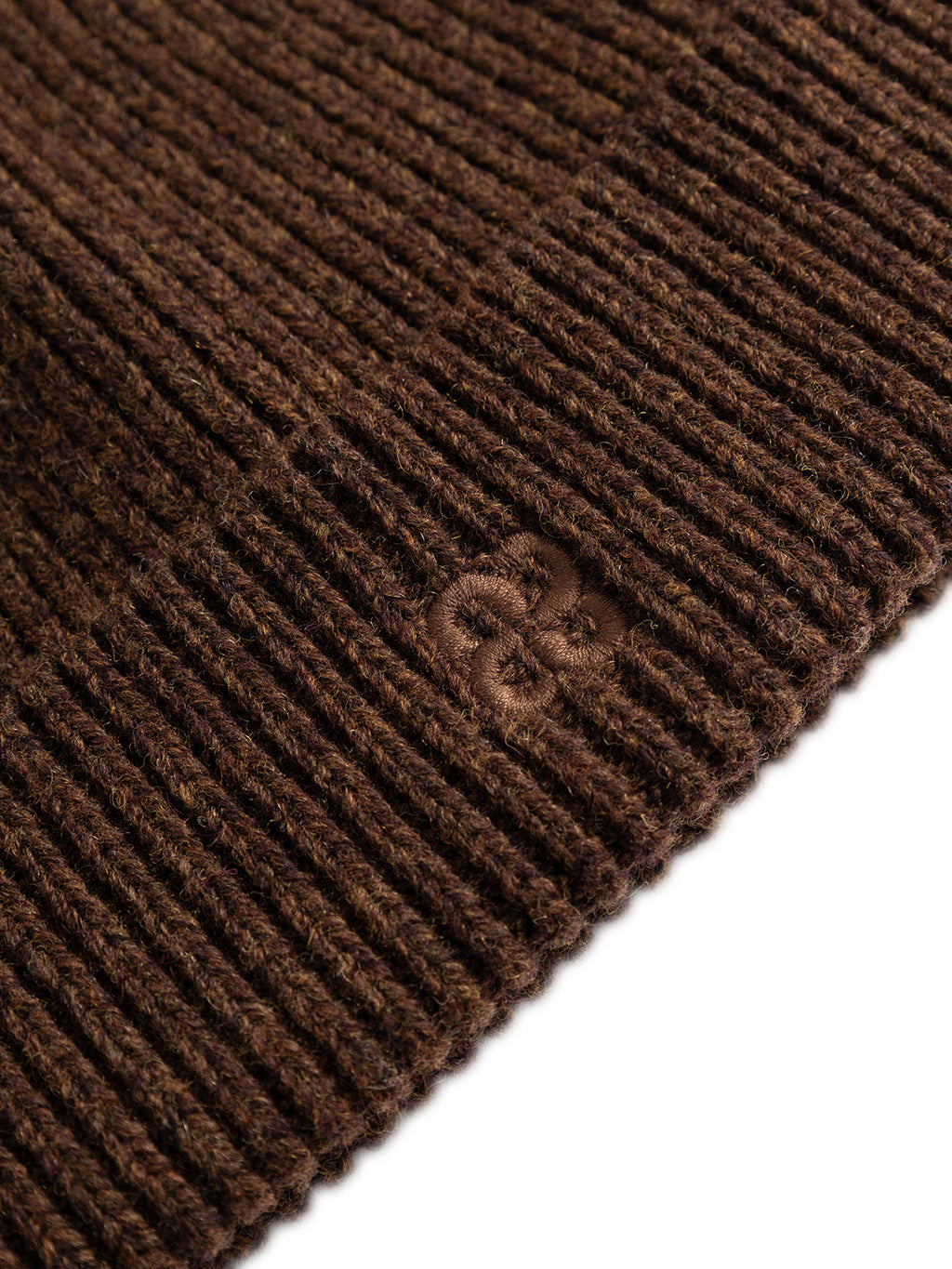 Close-up of the Gabba GABeast Flash Beanie in Brown Slate, featuring a ribbed knit design and a subtle embroidered logo on the folded edge, displayed against a white background—the perfect winter accessory.