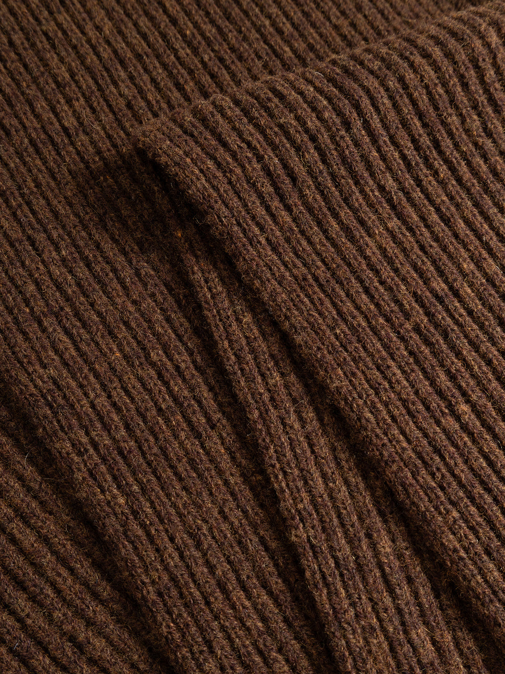 Close-up of the Gabba GABeast Flash Scarf in Brown Slate, folded to highlight its rib-knit texture and pattern—a cozy winter accessory perfect for staying warm.