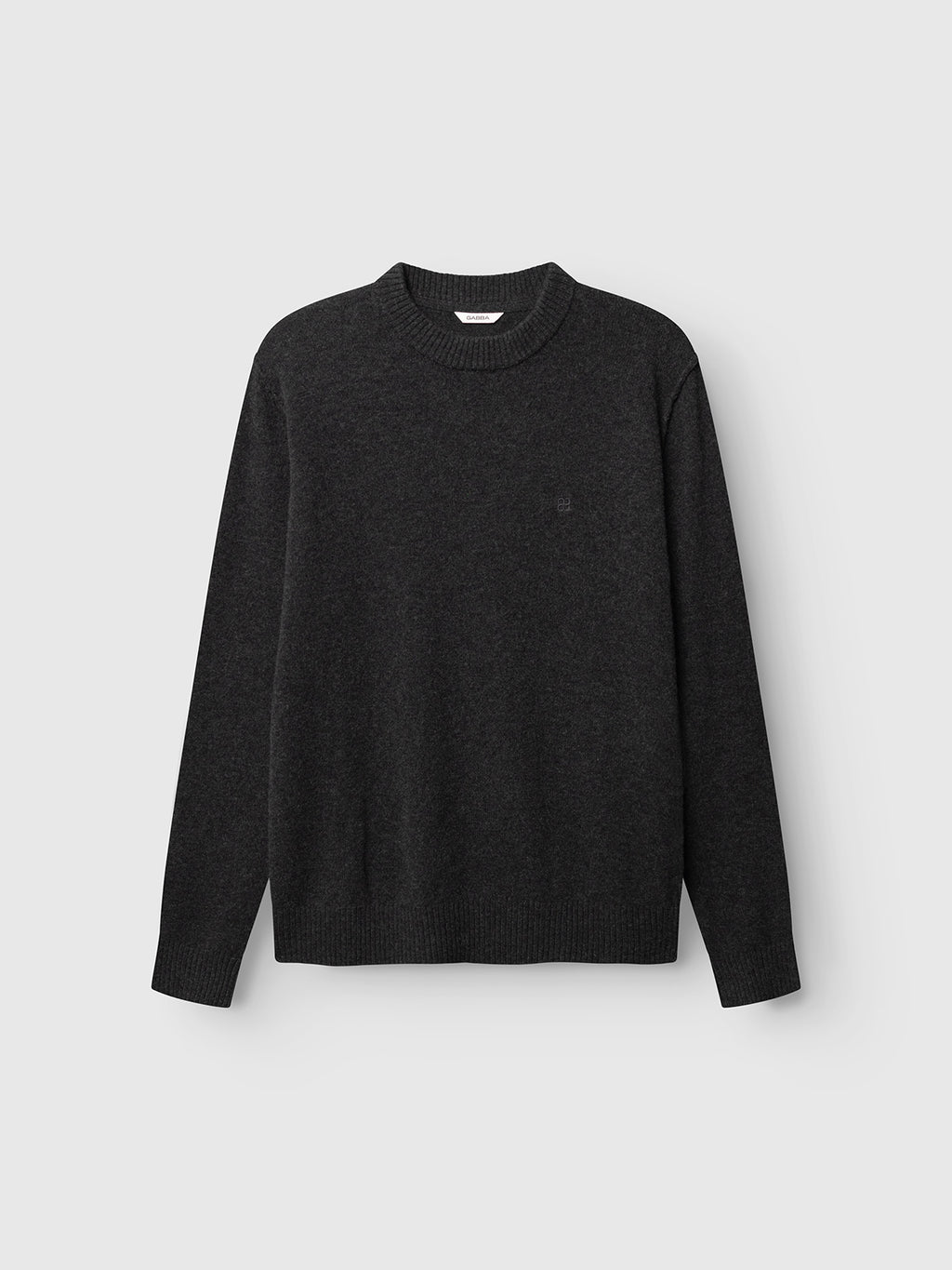 Displayed on a white background is the GABtokota Element Aico LS Knit in Dark Grey Mel. by Gabba, a long-sleeve crew neck knit sweater.