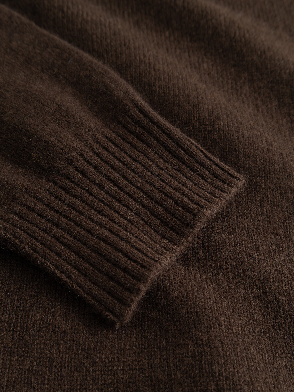 Close-up of the Gabba GABtokota Element Aico LS Knit in Brown Slate, showcasing the soft wool sleeve with a ribbed cuff and textured fabric—ideal for everyday comfort.