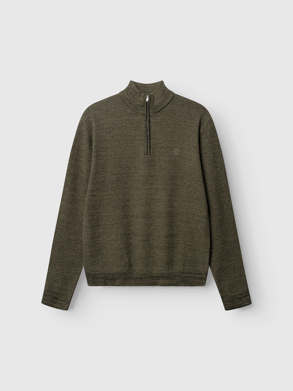 Gabba’s GABlamix Coro Half LS Knit in Forest Night is a soft cotton-blend pullover showcased against a plain light background. This knit sweater features a half-zip collar with a high neckline, long sleeves, and subtle textured detailing for added style.