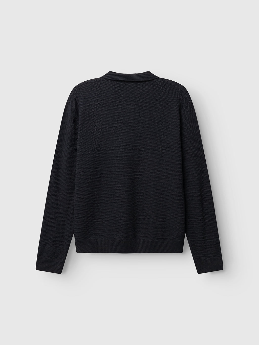 The GABlamix Coro Jhon LS Knit - Blue Black by Gabba is displayed flat on a light gray background, shown from the back with a simple crew neckline and no visible patterns or designs, crafted from a refined knit for an elevated touch.