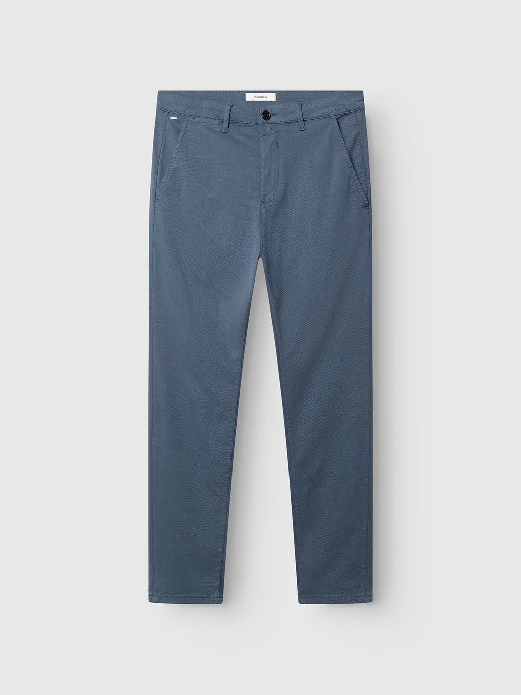 The Gabba GABpaul K3280 Dale Chino in Bering Sea is a blue slim, straight-leg pant with French pockets, back pockets, button closure, and belt loops, shown on a plain white background.