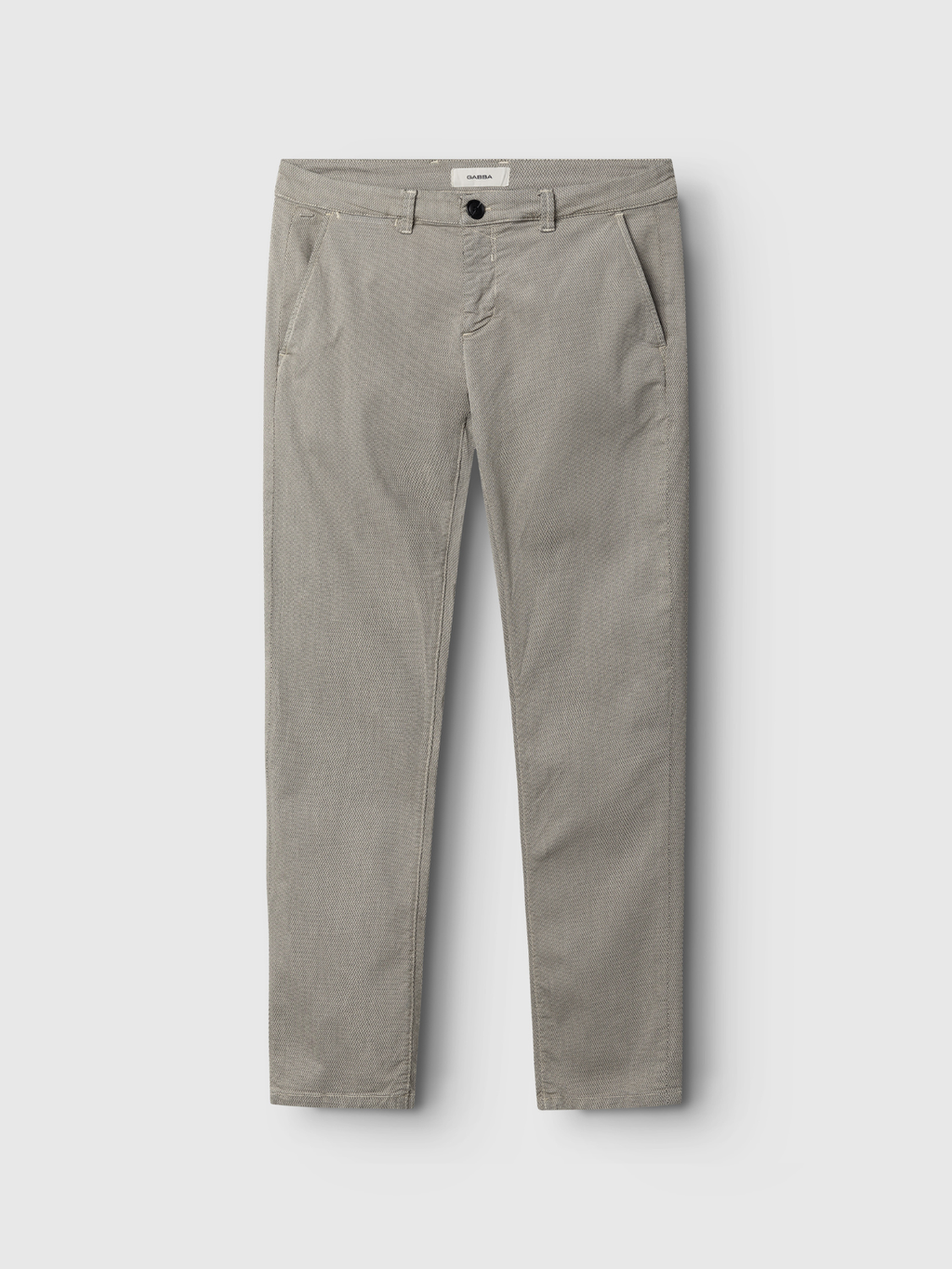 The Gabba GABpaul K3280 Dale Chino in Birch is a pair of slim-fit, light gray chinos with French side pockets, double paspel back pockets, and a front button closure, shown laid flat on a white background.