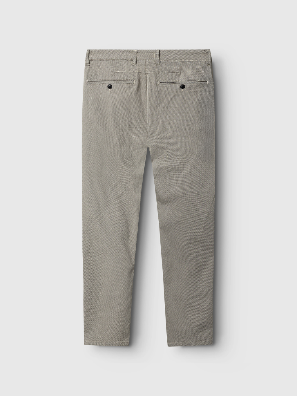 The Gabba GABpaul K3280 Dale Chino in Birch is shown from the back, highlighting double paspel back pockets with button closures and subtle stitching, laid flat on a white background.