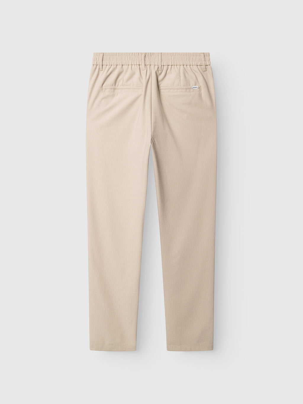 Back view of Gabba's GABmonza Tasca Deme Pant in Birch, showcasing a relaxed straight fit, elastic waistband, and two back welt pockets against a plain white background.