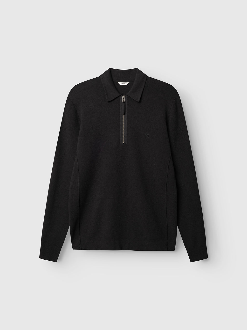 The Gabba GABadriel Half Zip Lume LS Knit in Meteorite features a black long-sleeve pullover design with a zip-up collar and a subtle, minimalist aesthetic. Crafted from a soft viscose blend in a regular-fit knit, this half-zip sweater is shown against a plain light gray background.