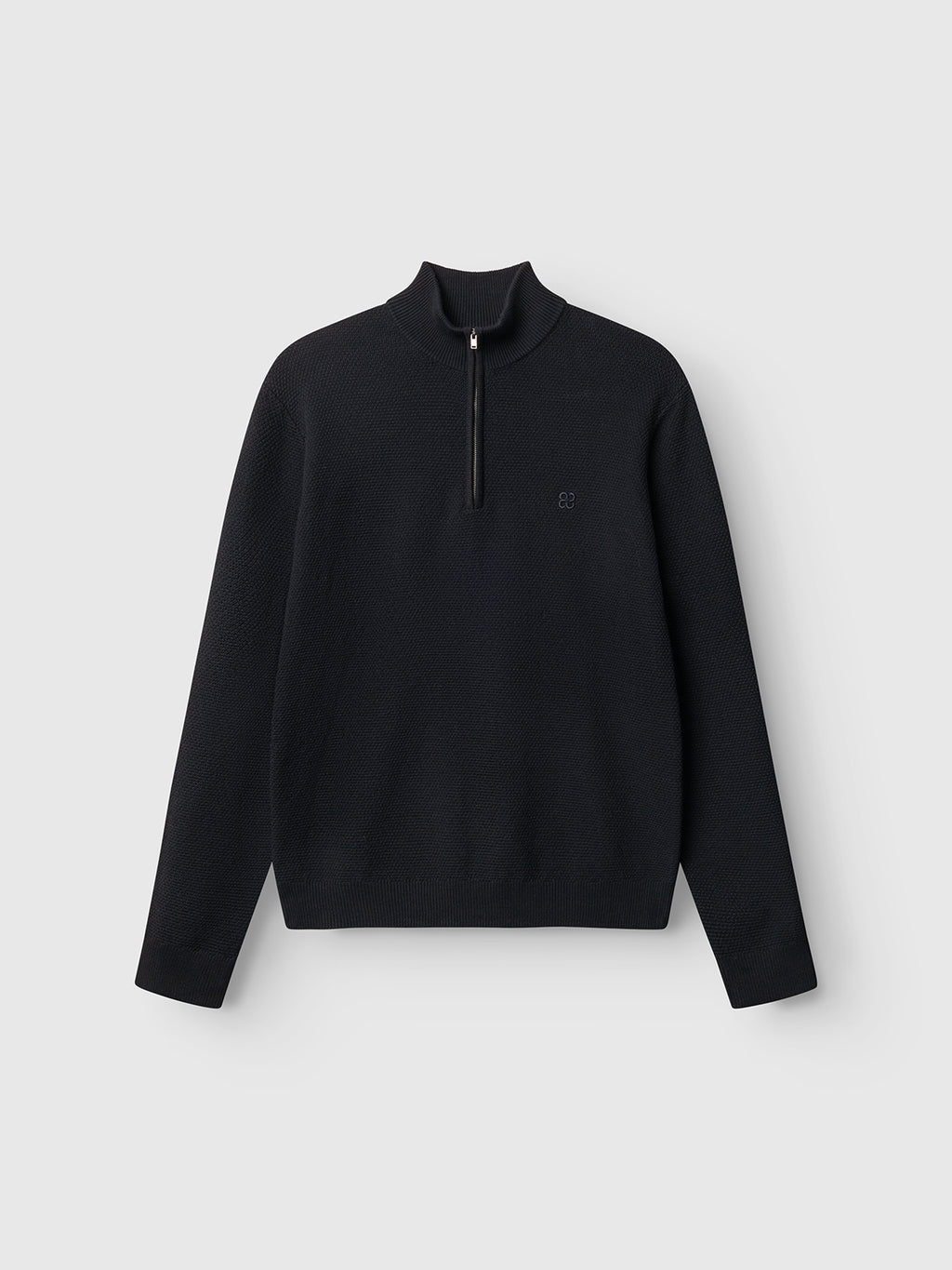 The Gabba GABlamix Coro Half LS Knit in Blue Black is a long-sleeve pullover sweater made from a soft cotton-blend knit, featuring a stand collar and a half-zip front, shown against a plain light gray background.